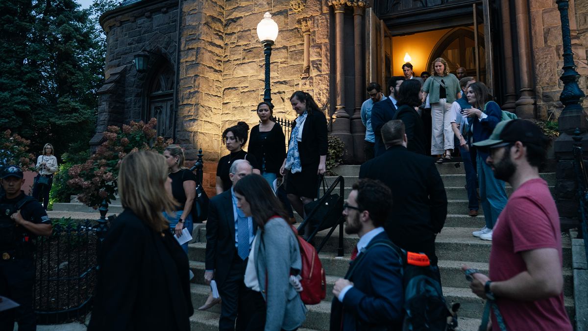 Mourners leave mass in DC
