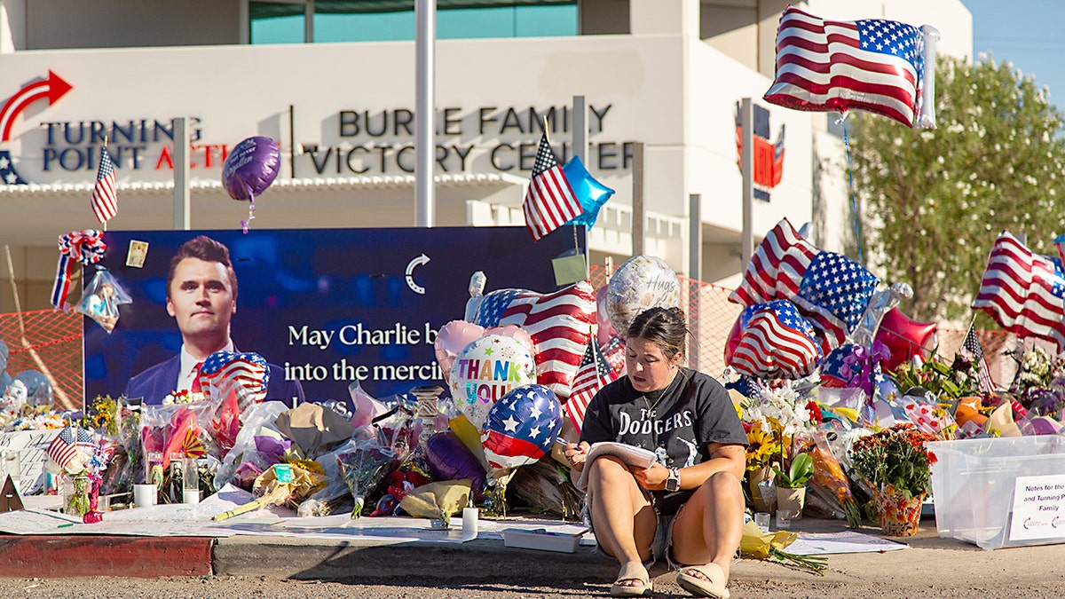 Grievers visit Charlie Kirk's memorial at TPUSA in Phoenix.