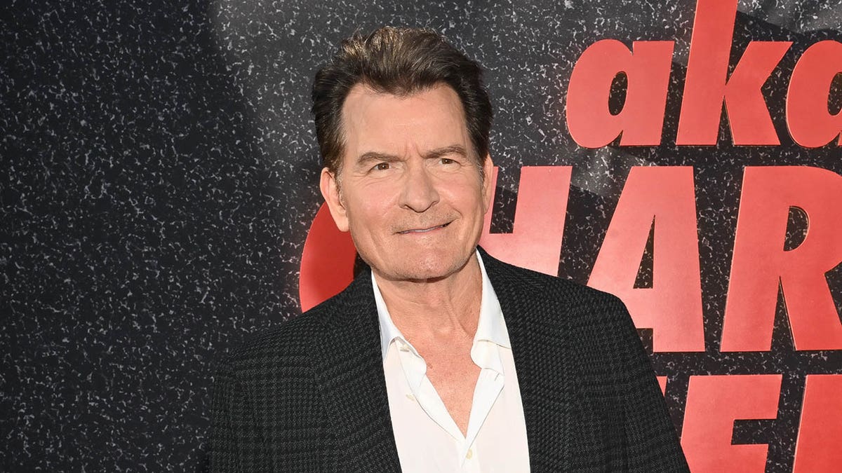 Charlie Sheen poses at the premiere of his documentary. 