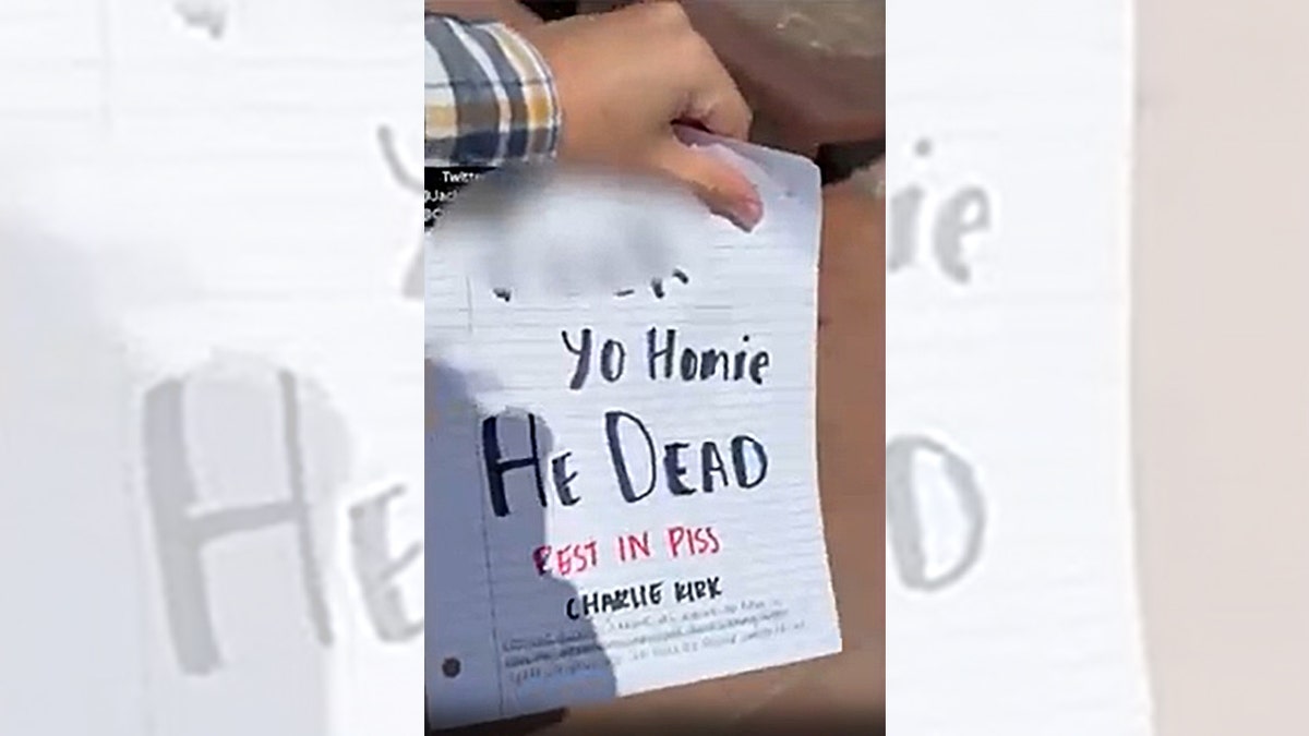 A flyer from a Clemson University student is seen during a video posted online after Charlie Kirk's assassination.