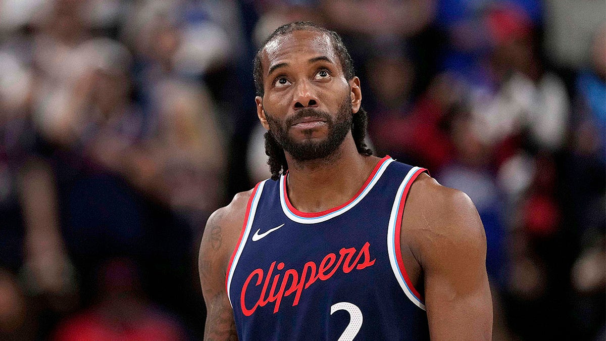 Kawhi Leonard looks on