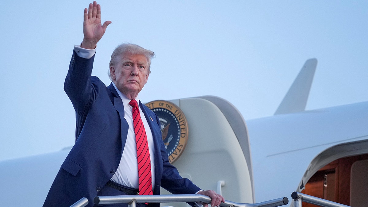 Donald Trump boards Air Force One