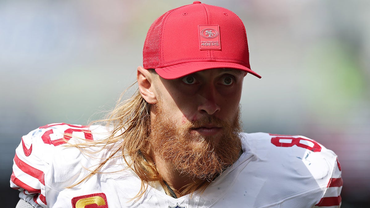 George Kittle looks on field