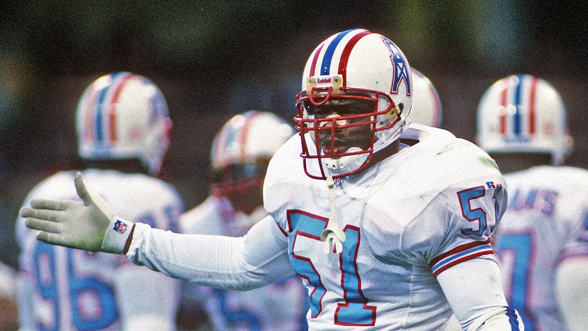 Micheal Barrow motions to the sideline