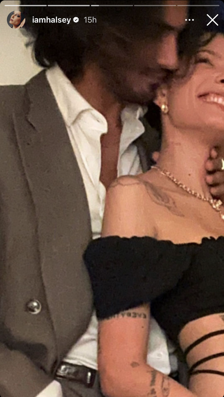 a man and woman kissing