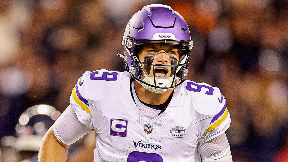 J.J. McCarthy celebrates touchdown