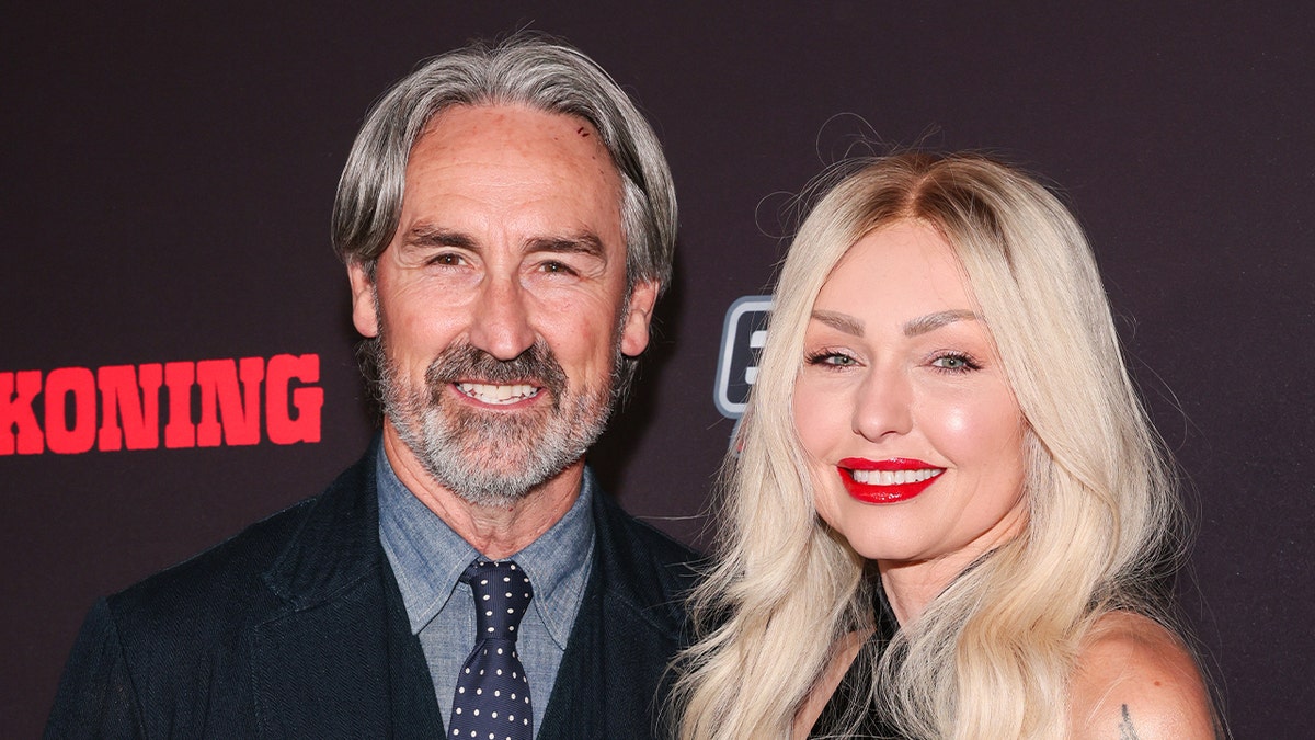 American Pickers star Mike Wolfe walks red carpet with girlfriend Leticia Cline.