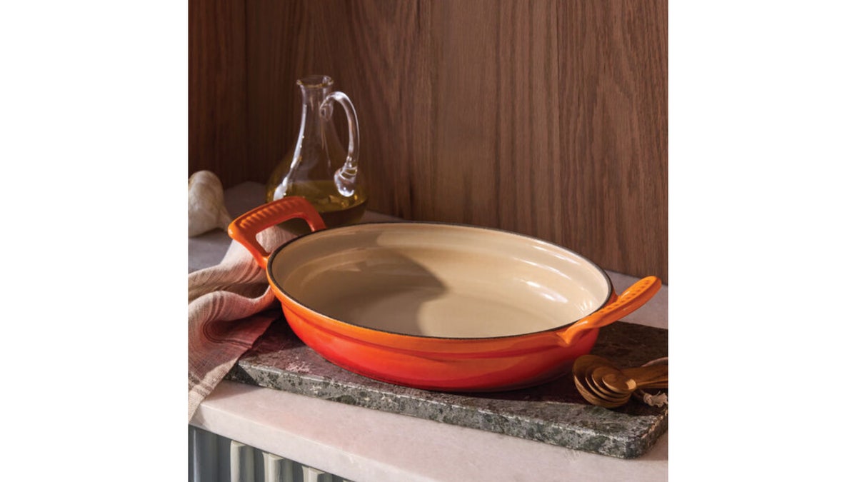 The oval gratin is made to go directly from the oven to the table as a serving dish.