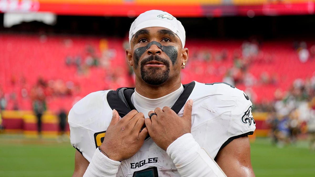 Jalen Hurts walks off the field