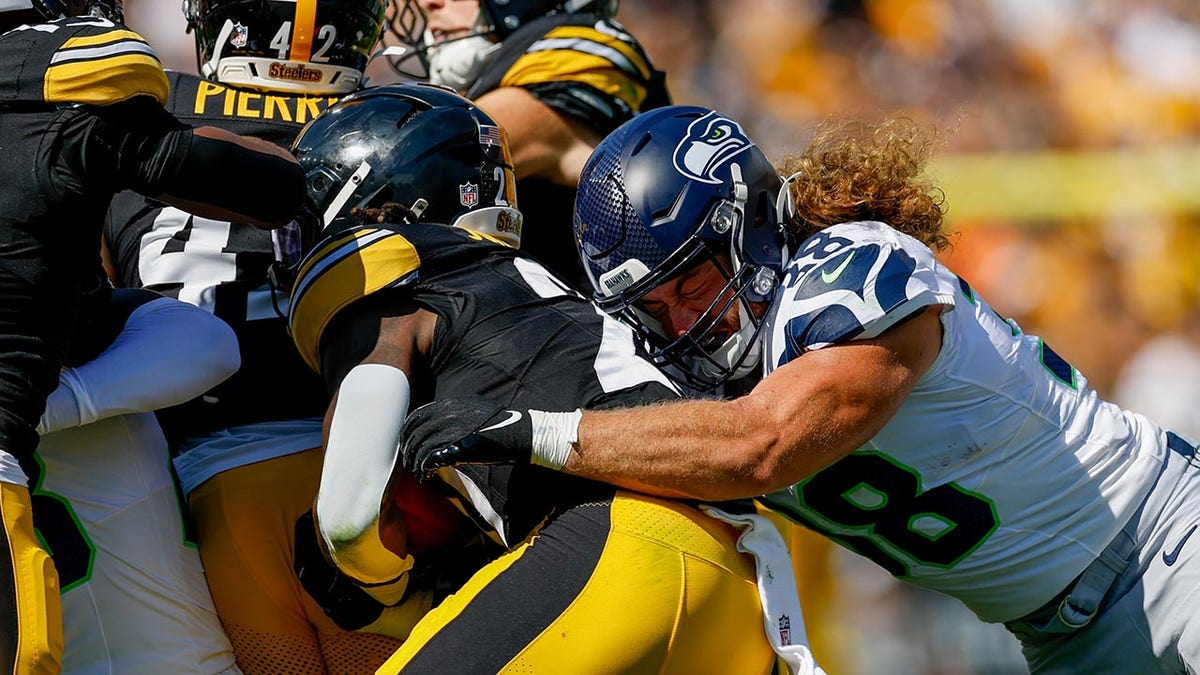 AJ Barner tackled