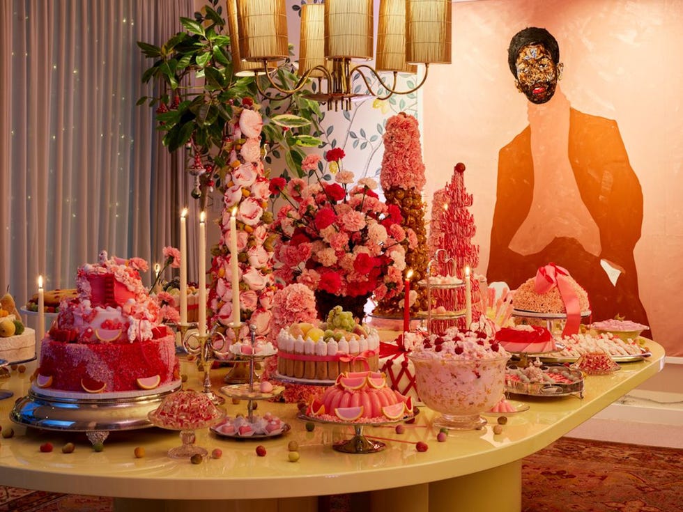 a table with many extravagant pastries on it