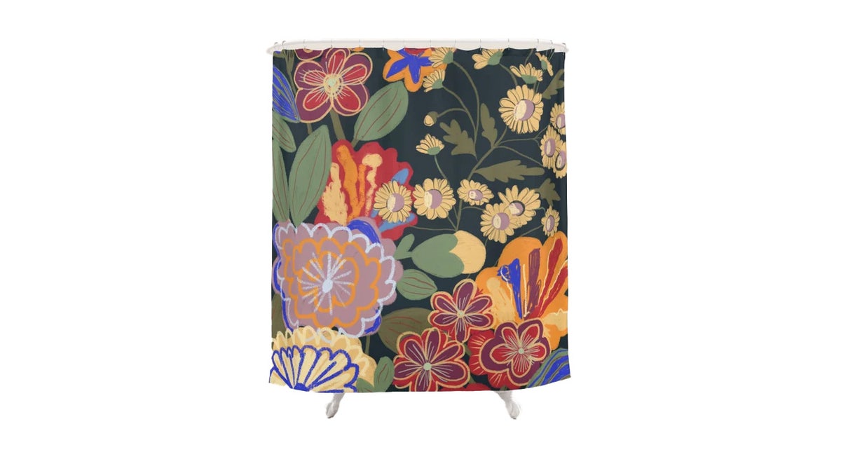 Infuse some color into your bathroom with a bold shower curtain.