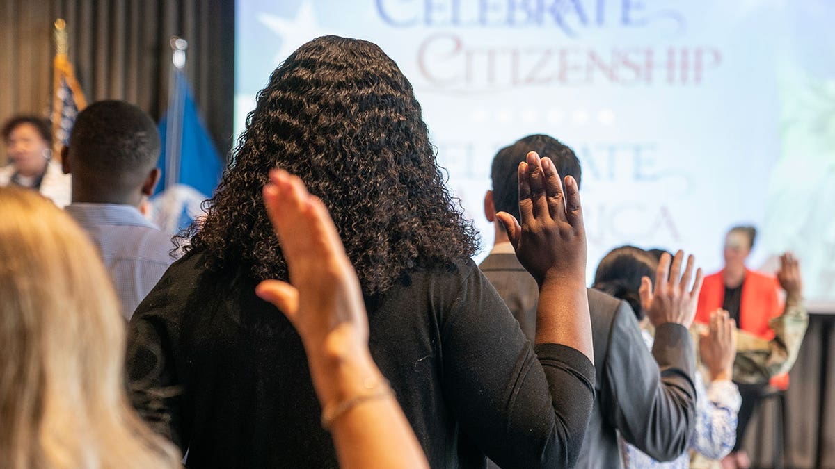 New naturalized US citizens take the Oath of Allegiance