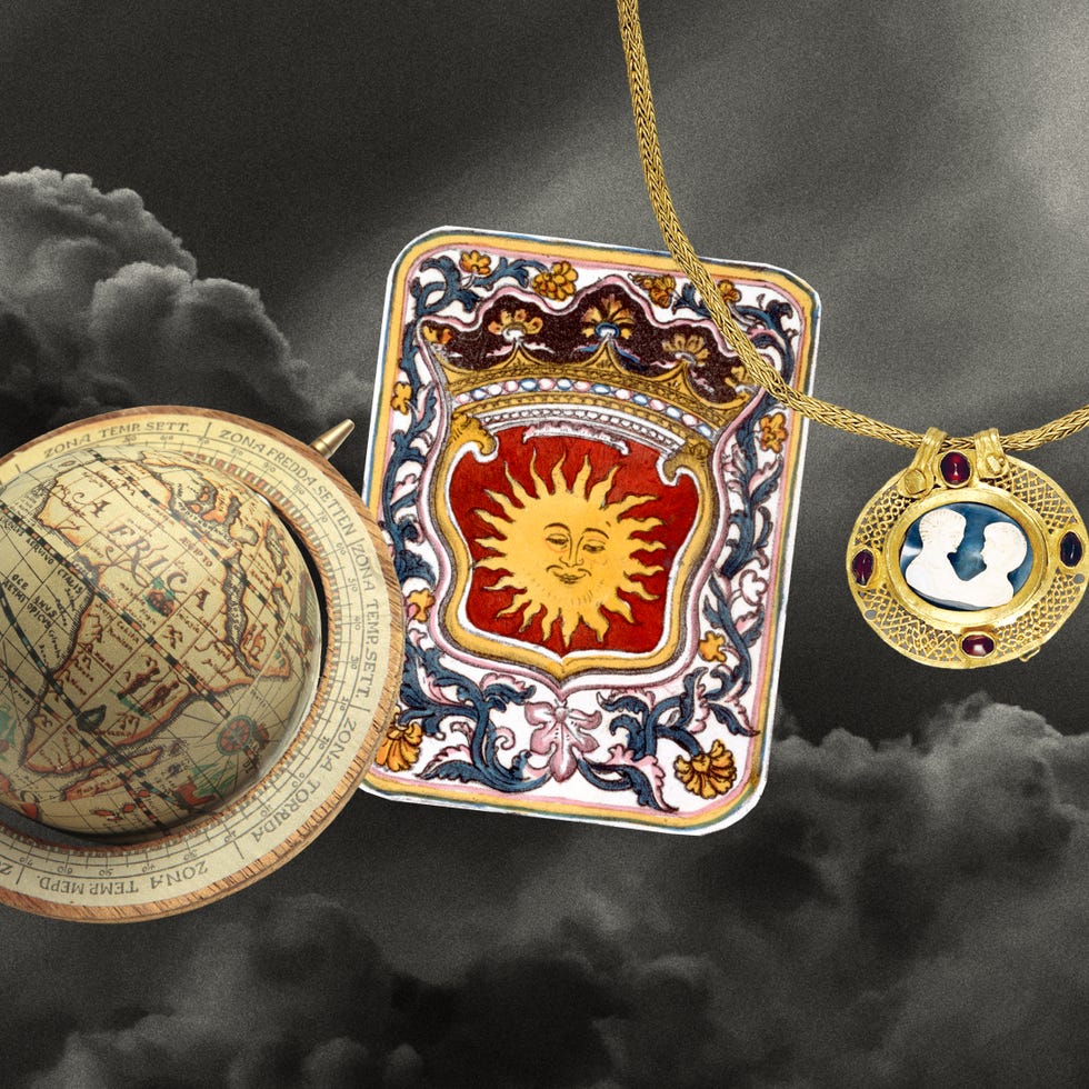 collage of a globe, a tarot card, and a gold necklace set against the night sky