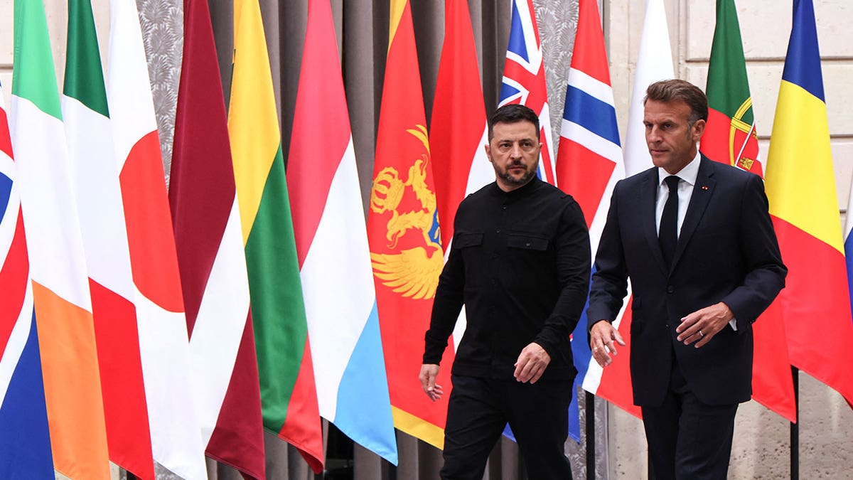 Macron walks with Zelenskyy