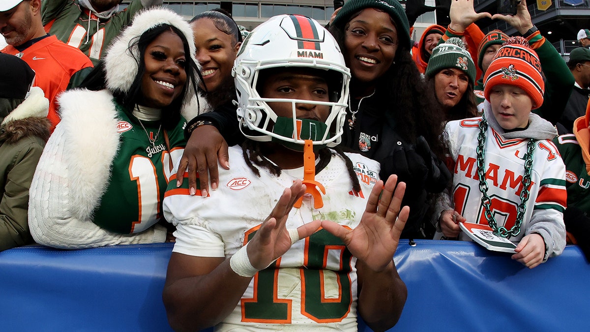 Malachi Toney looks on