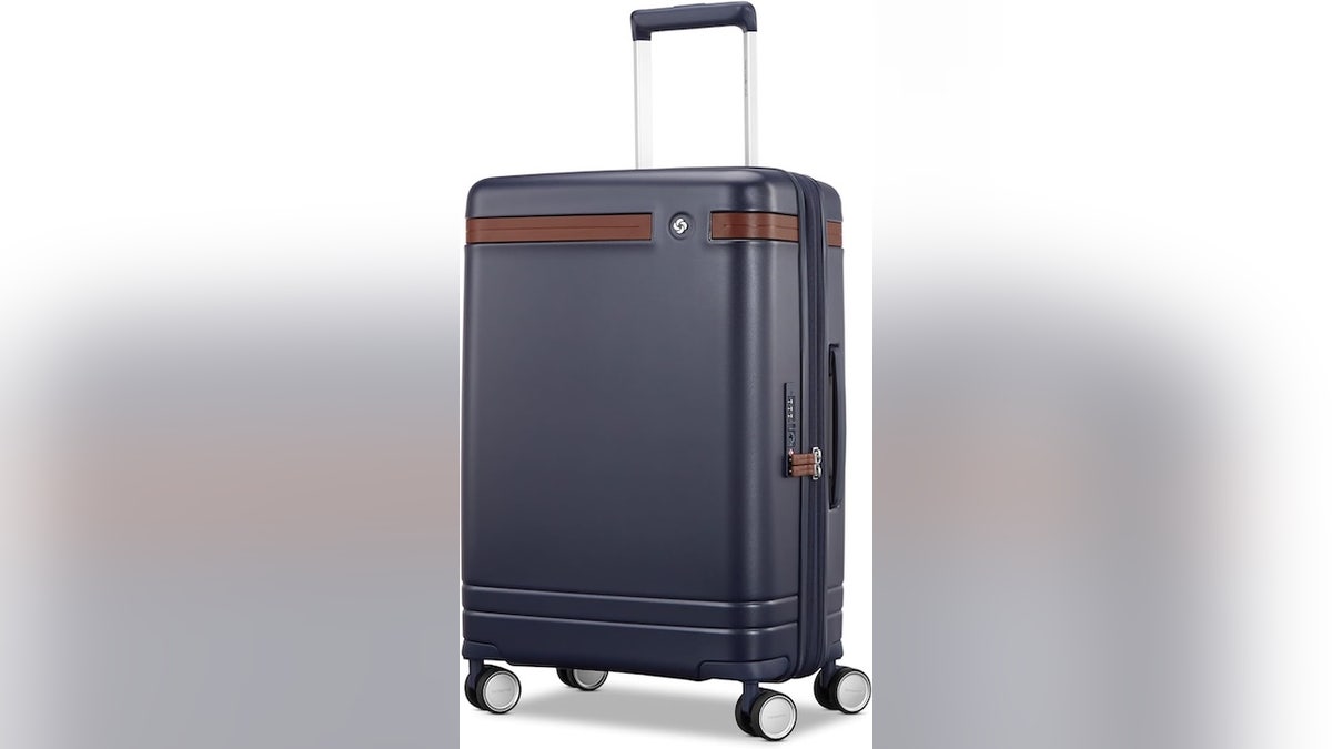 If you're tired of boring black luggage, this spinner adds a touch of style.